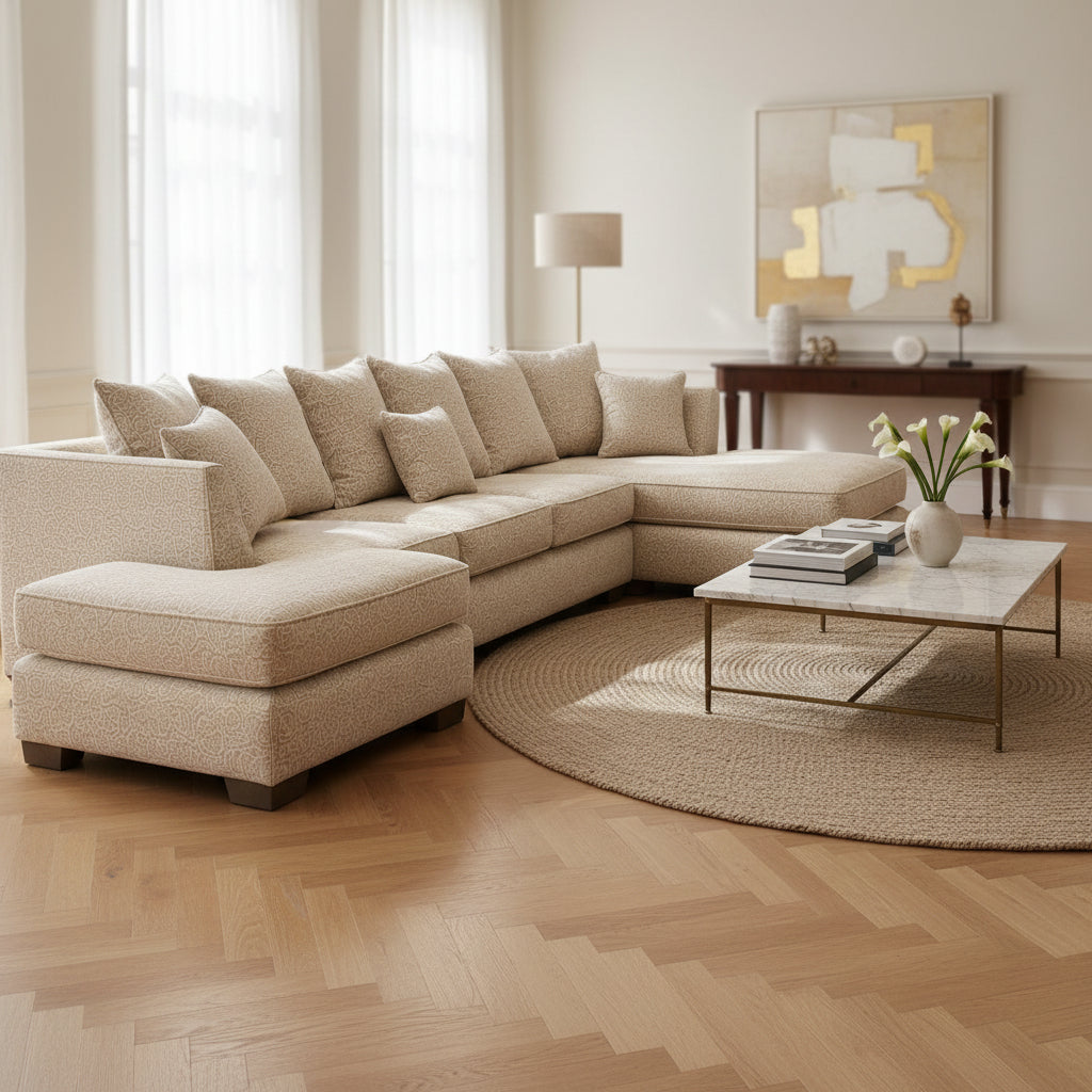 Beige sectional sofa on a plain gray background
